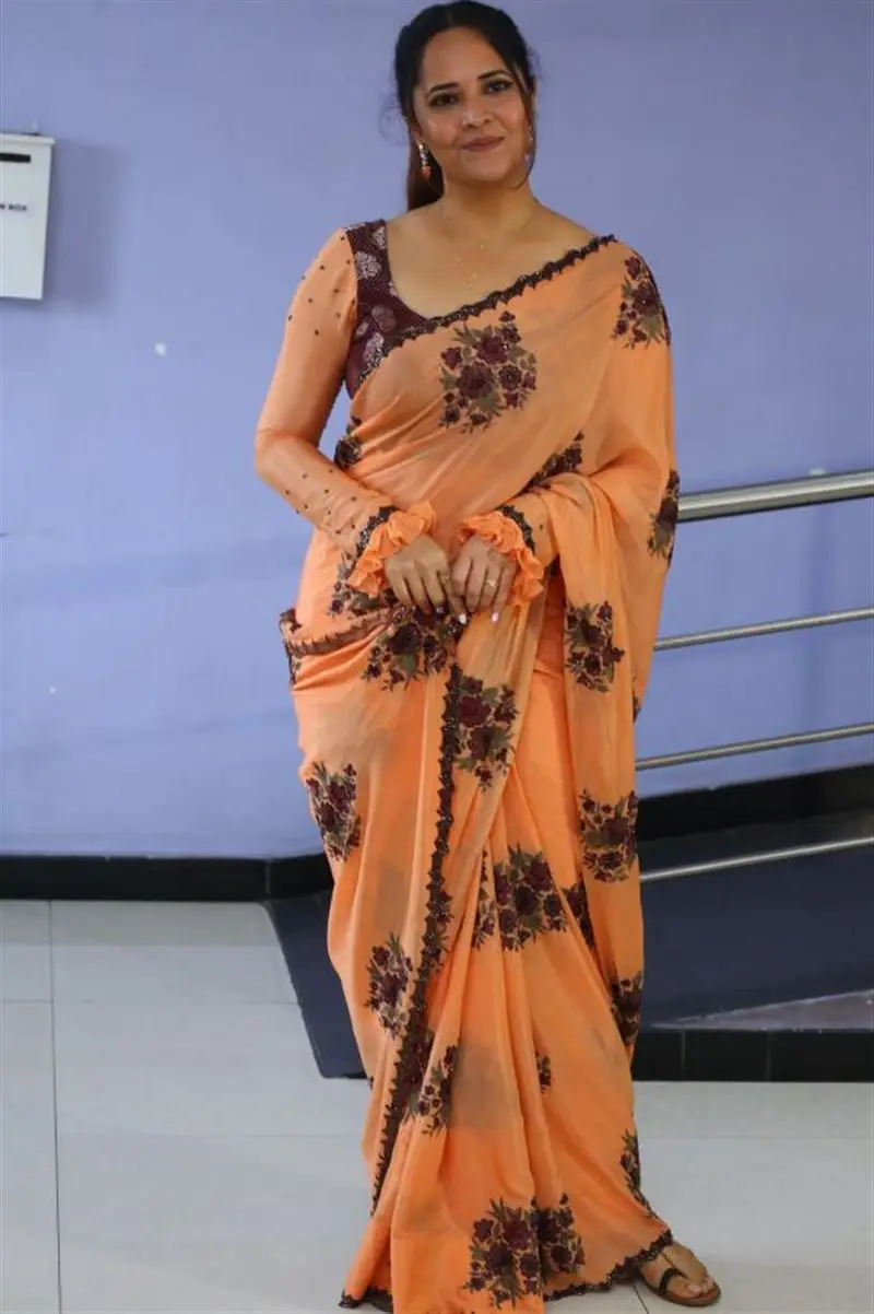 Telugu Actress Anasuya Bharadwaj In Beautiful Orange Saree